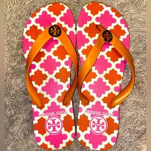 Tory Burch flip flops. Orange, pink, and white. Fit a true 7.5.